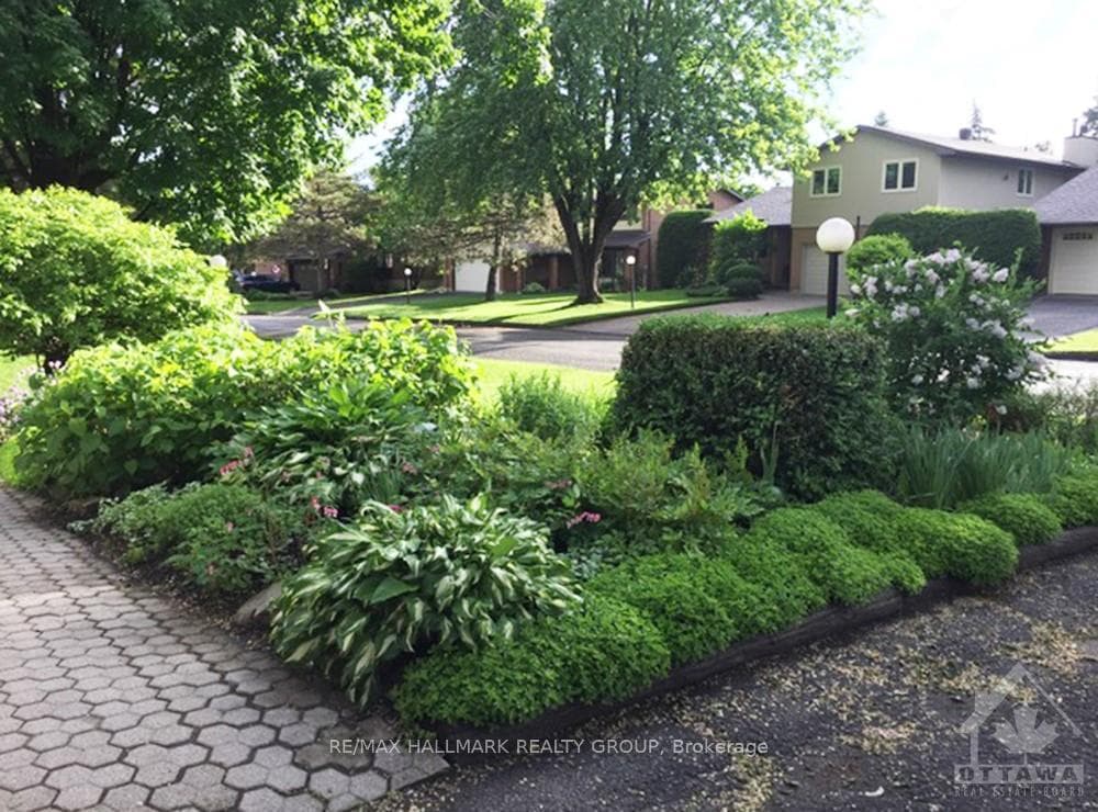 Lovely mature landscaping front and back