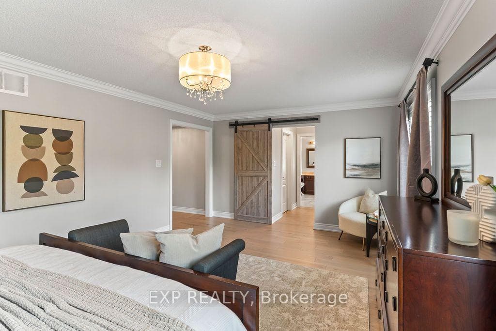 Expansive primary bdrm with his-and-hers walk-ins