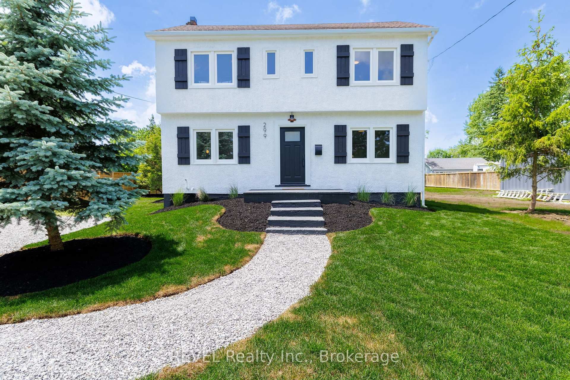 Stairs and porch leading to front door