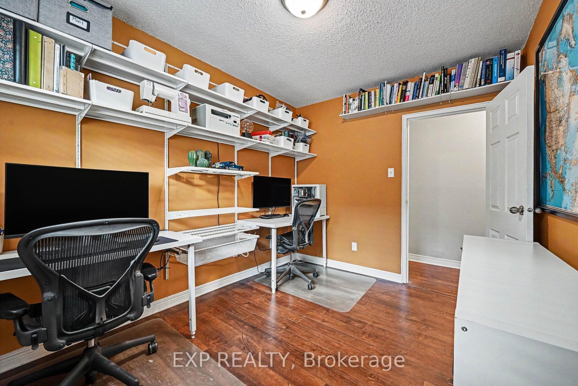 Built-in shelving & desks included.