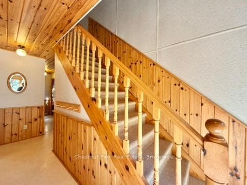 Foyer and stairs to upper level