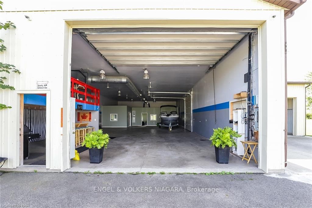 OUT BUILDING WITH LARGE GARAGE DOOR