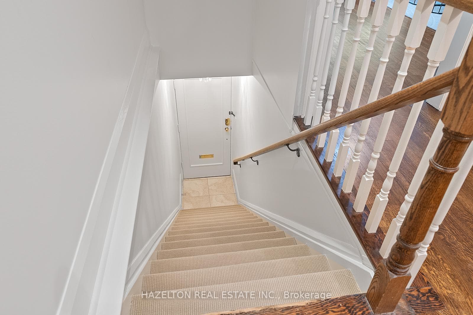 looking down the stairs towards front door