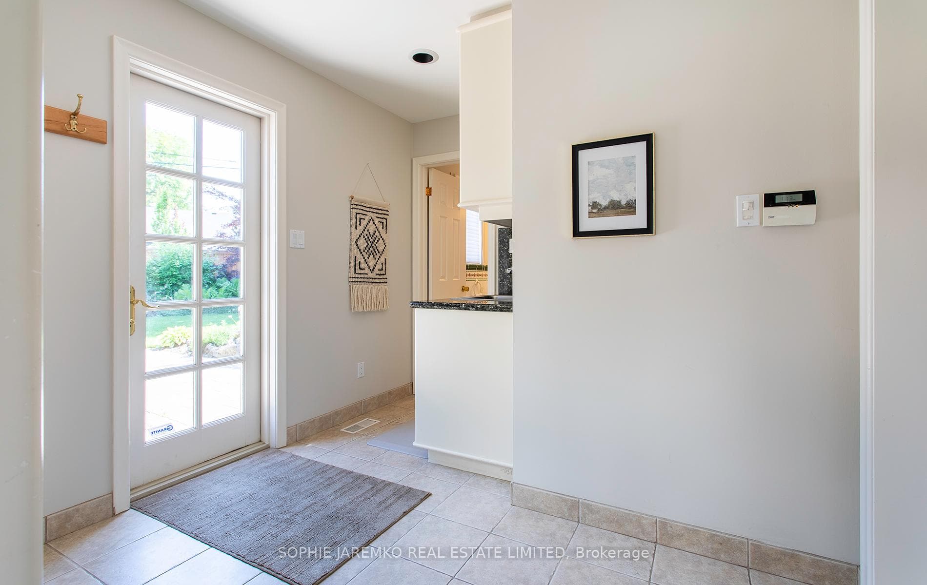 Mud Room - Discrete powder room Walk/O to backyard
