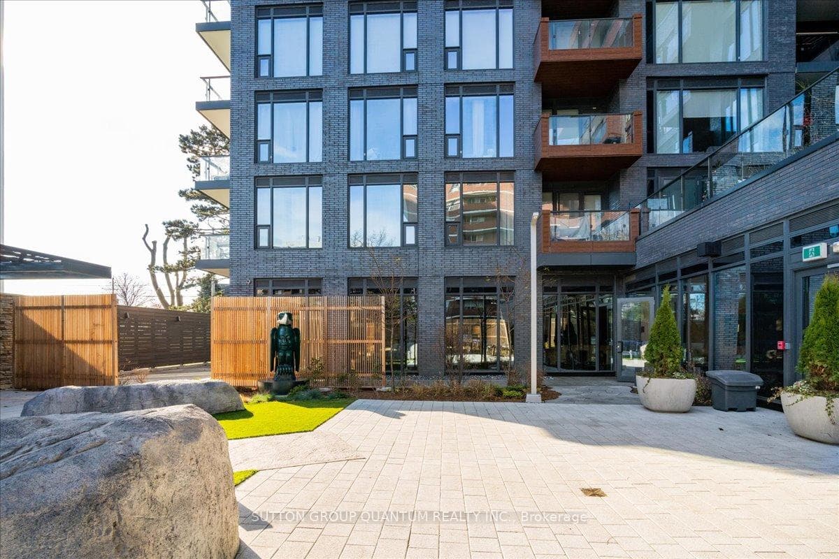 Outdoor courtyard with BBQ's and patio areas.