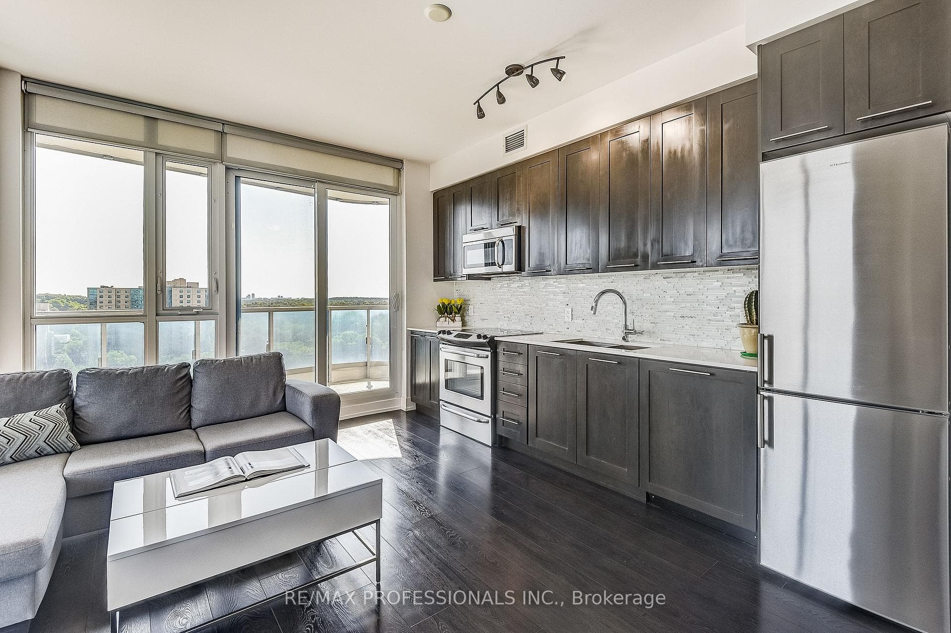 Open Concept Kitchen with Walk-Out to Balcony