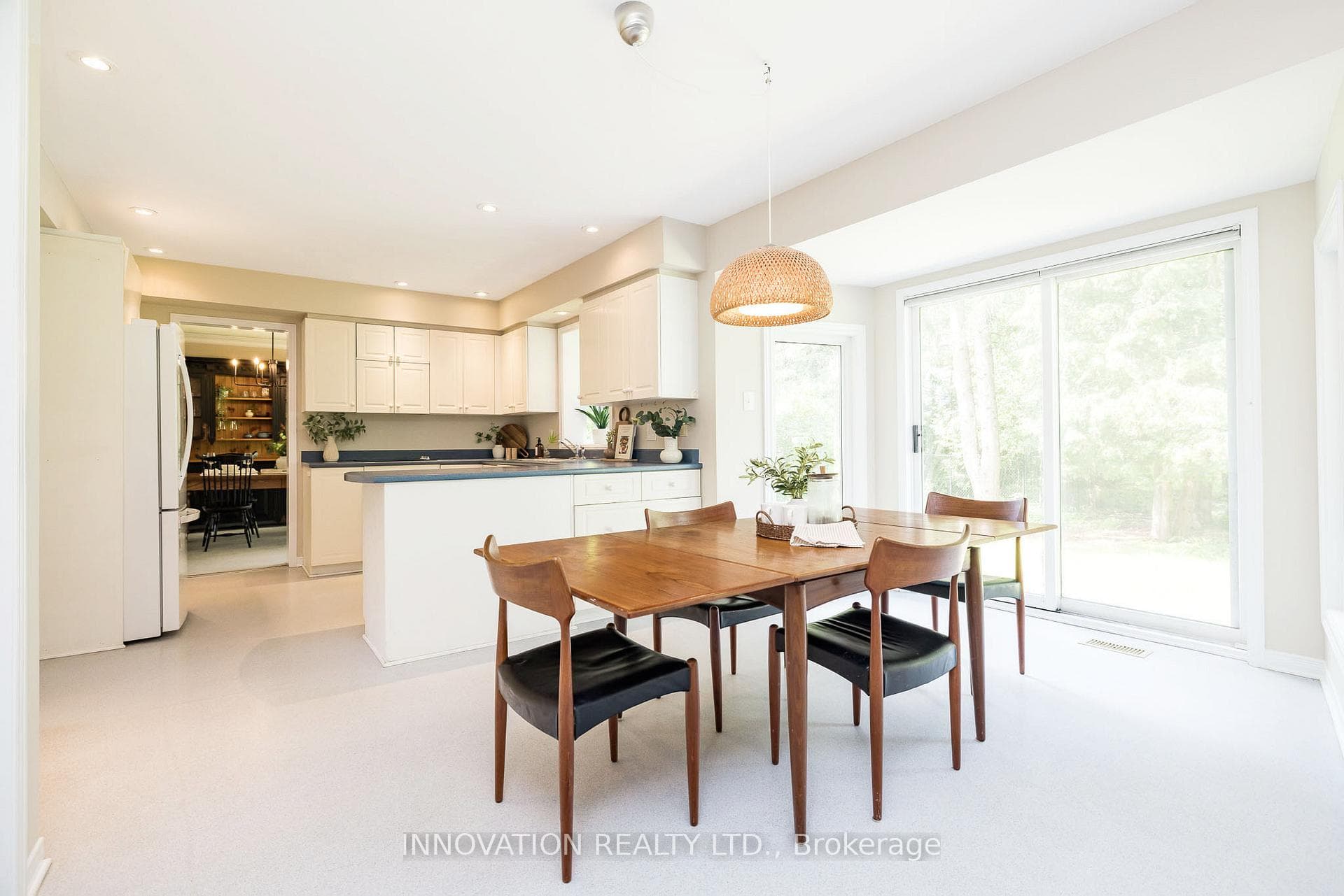 Large eat-in kitchen with patio doors to back yard