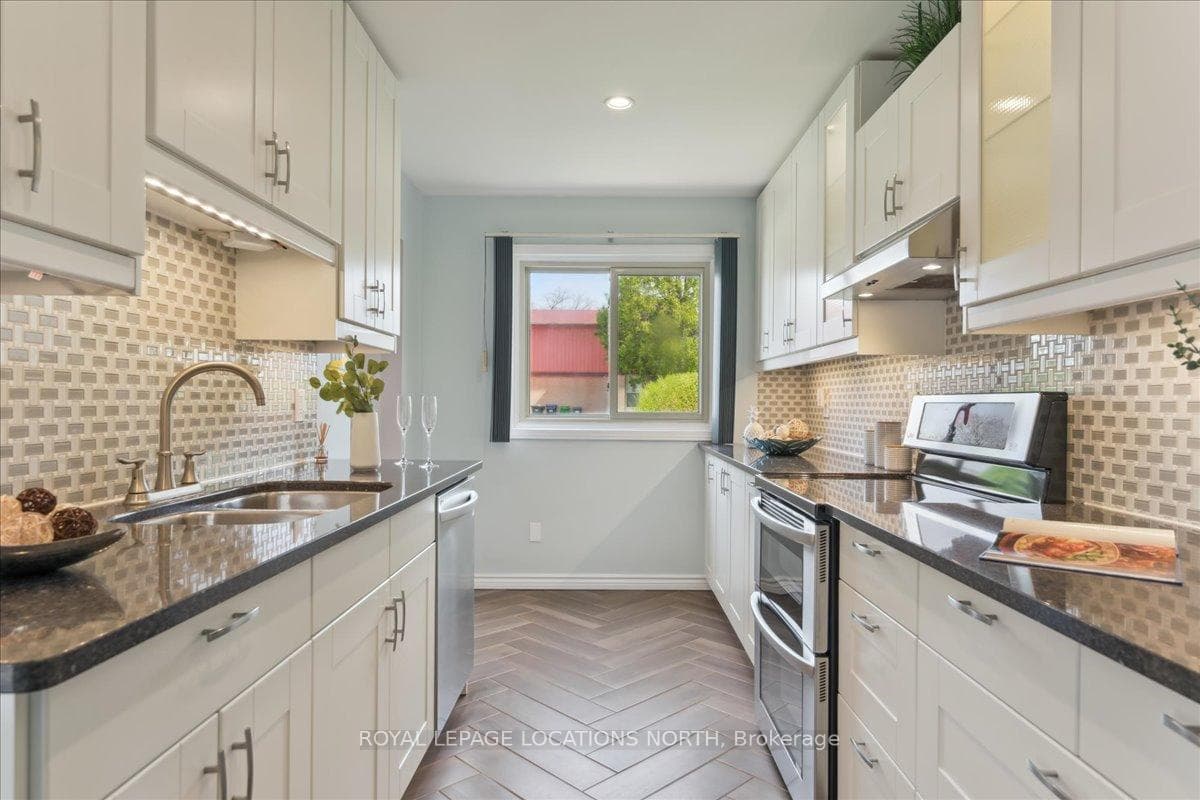 Kitchen looking towards front window.