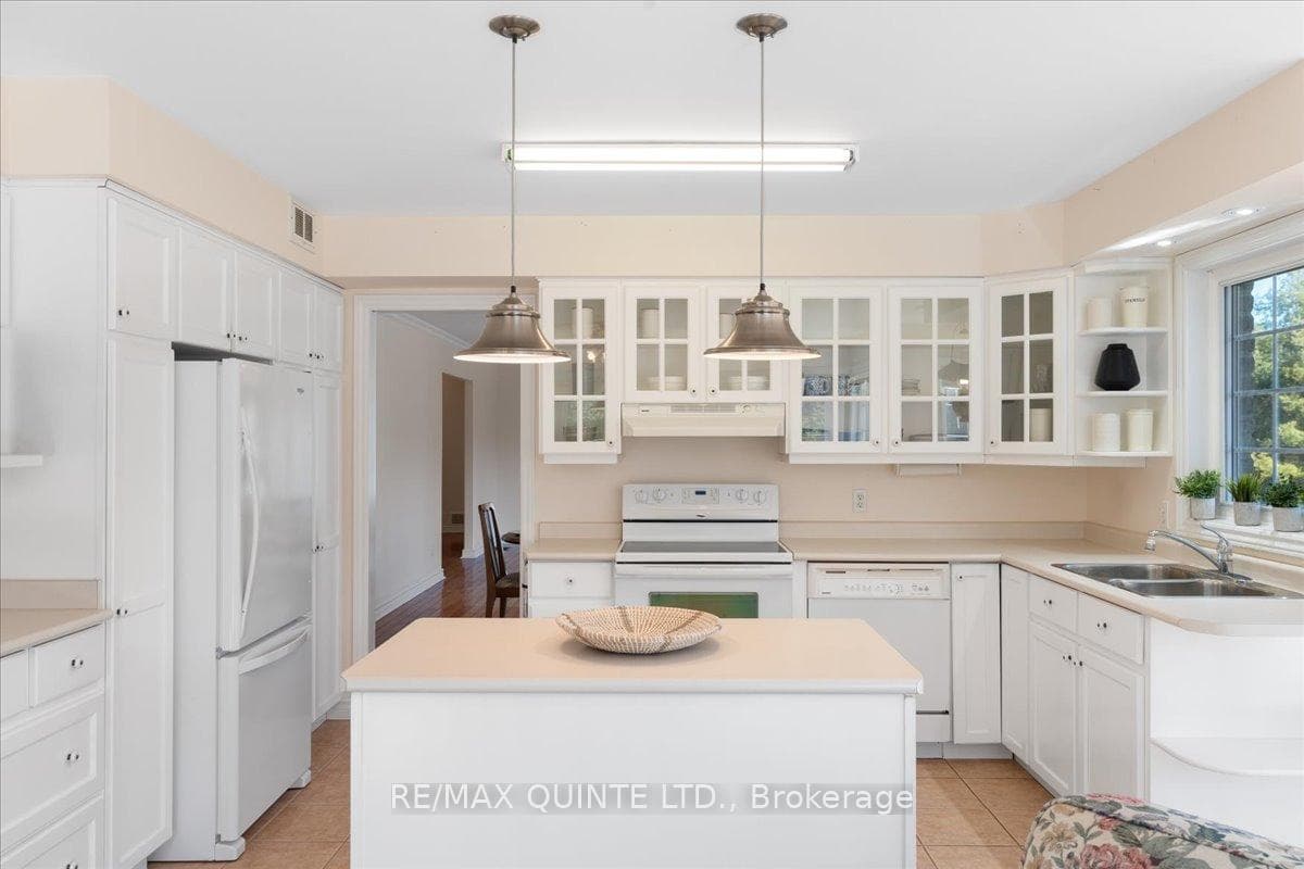 kitchen with plenty of storage space - very bright