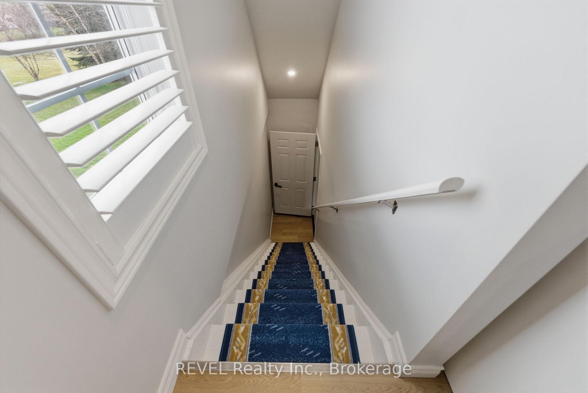 STAIRS TO LOFT ABOVE GARAGE