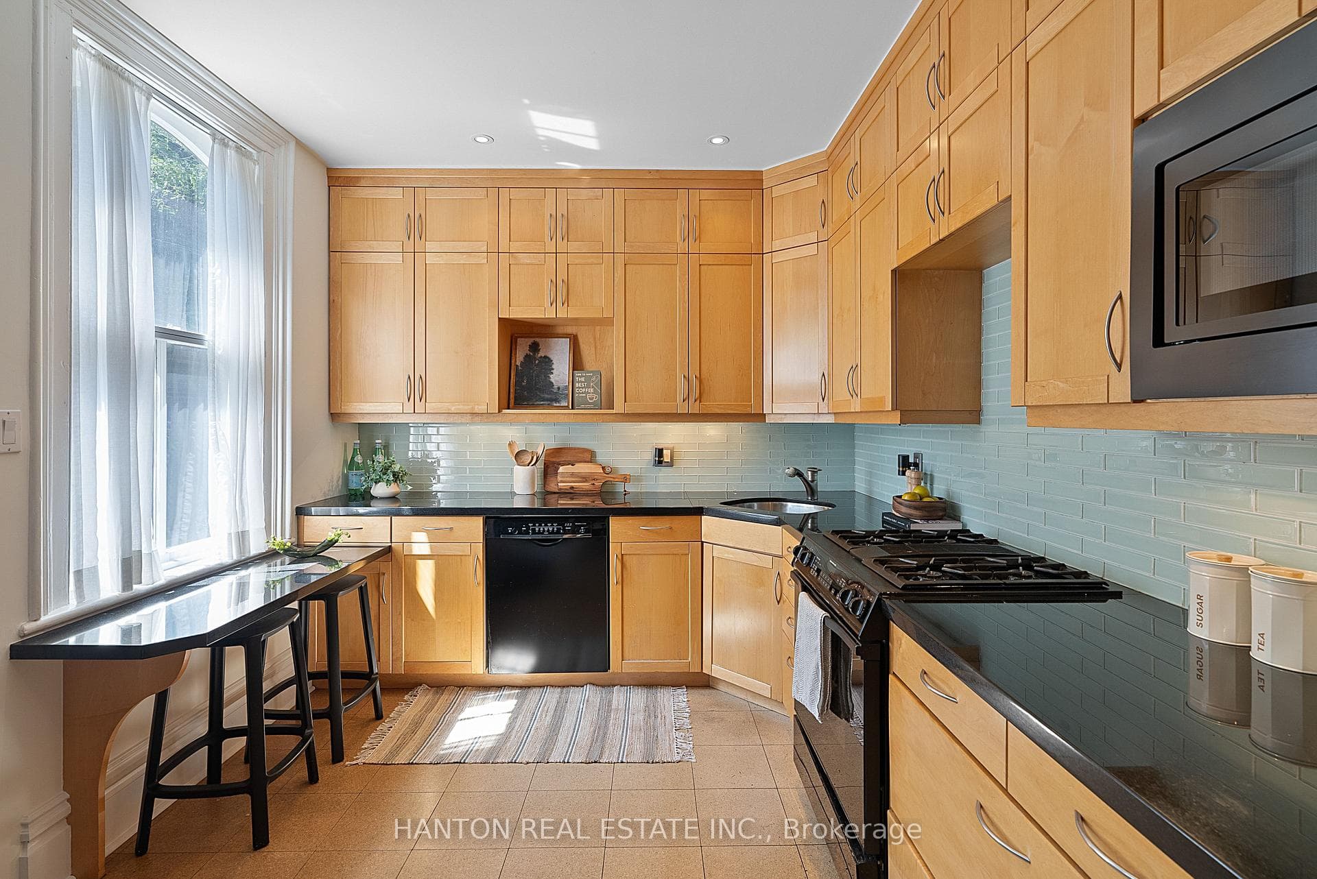 Built-in Appliances and Cabinetry to the Ceiling