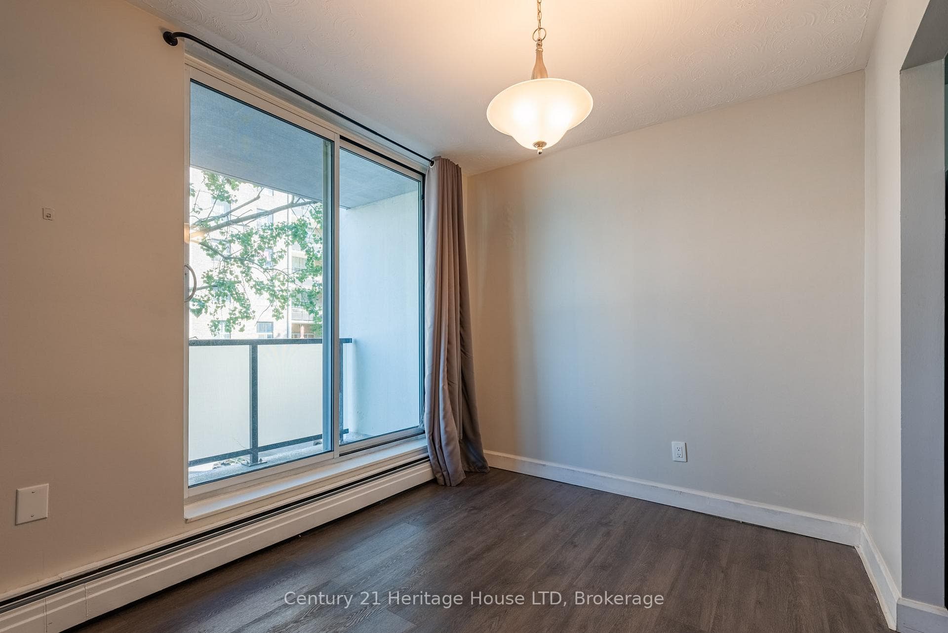 Dining Room and Sliding Glass Door to Balcony