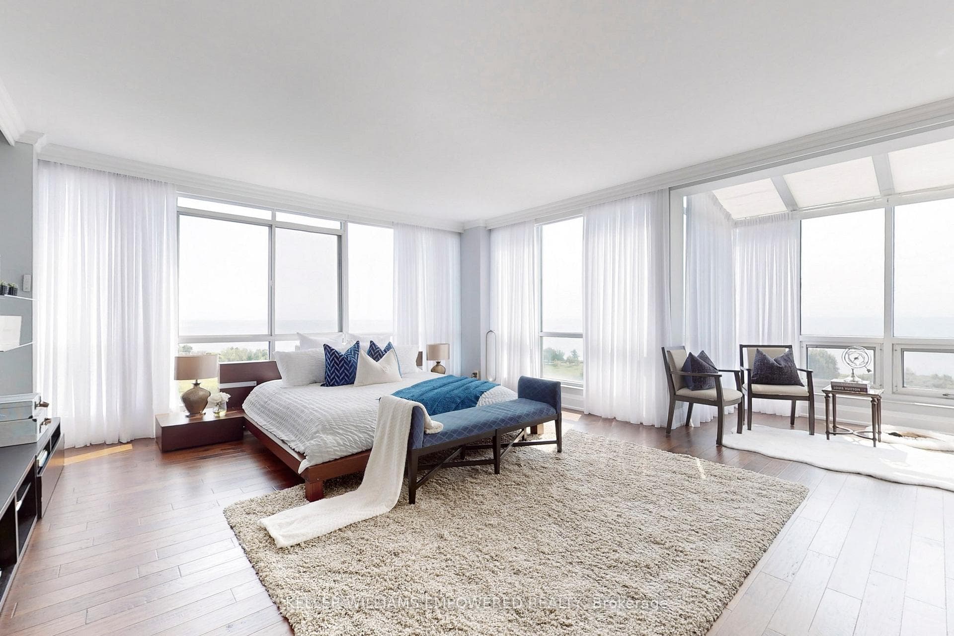 Airy ambiance of 9' smooth ceilings & lake views