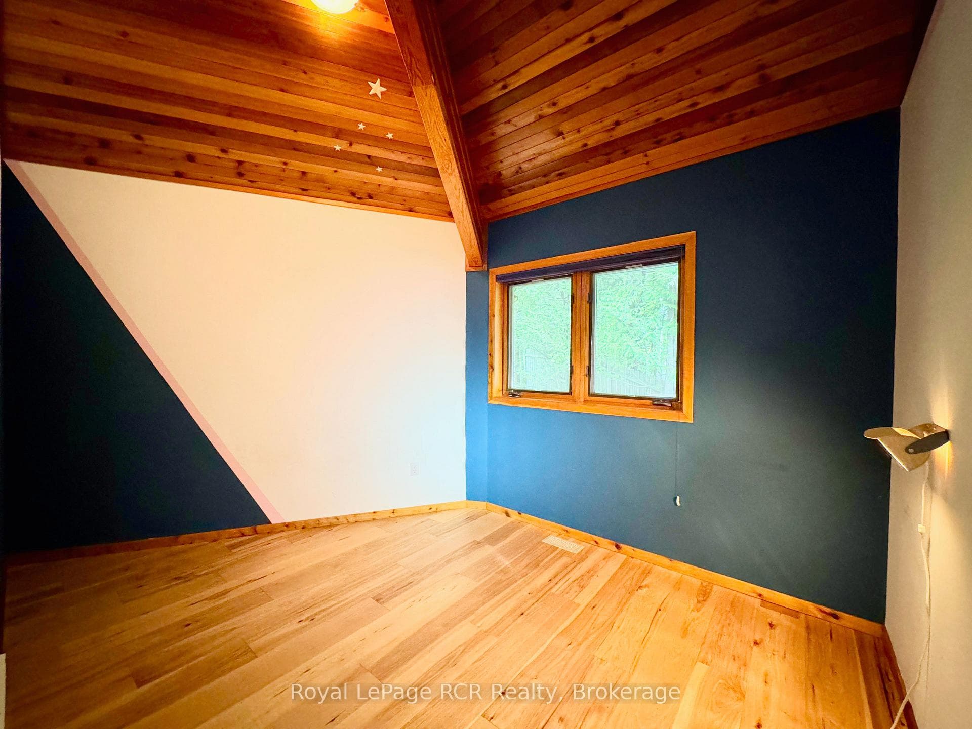 2nd bedroom with funky shape & design.