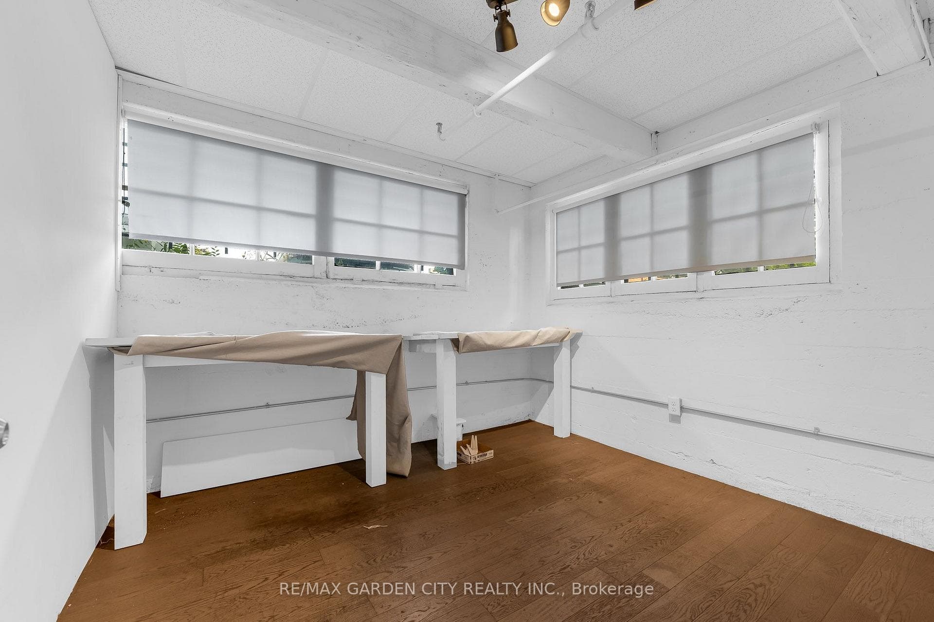 2nd office divided by glass wall and door