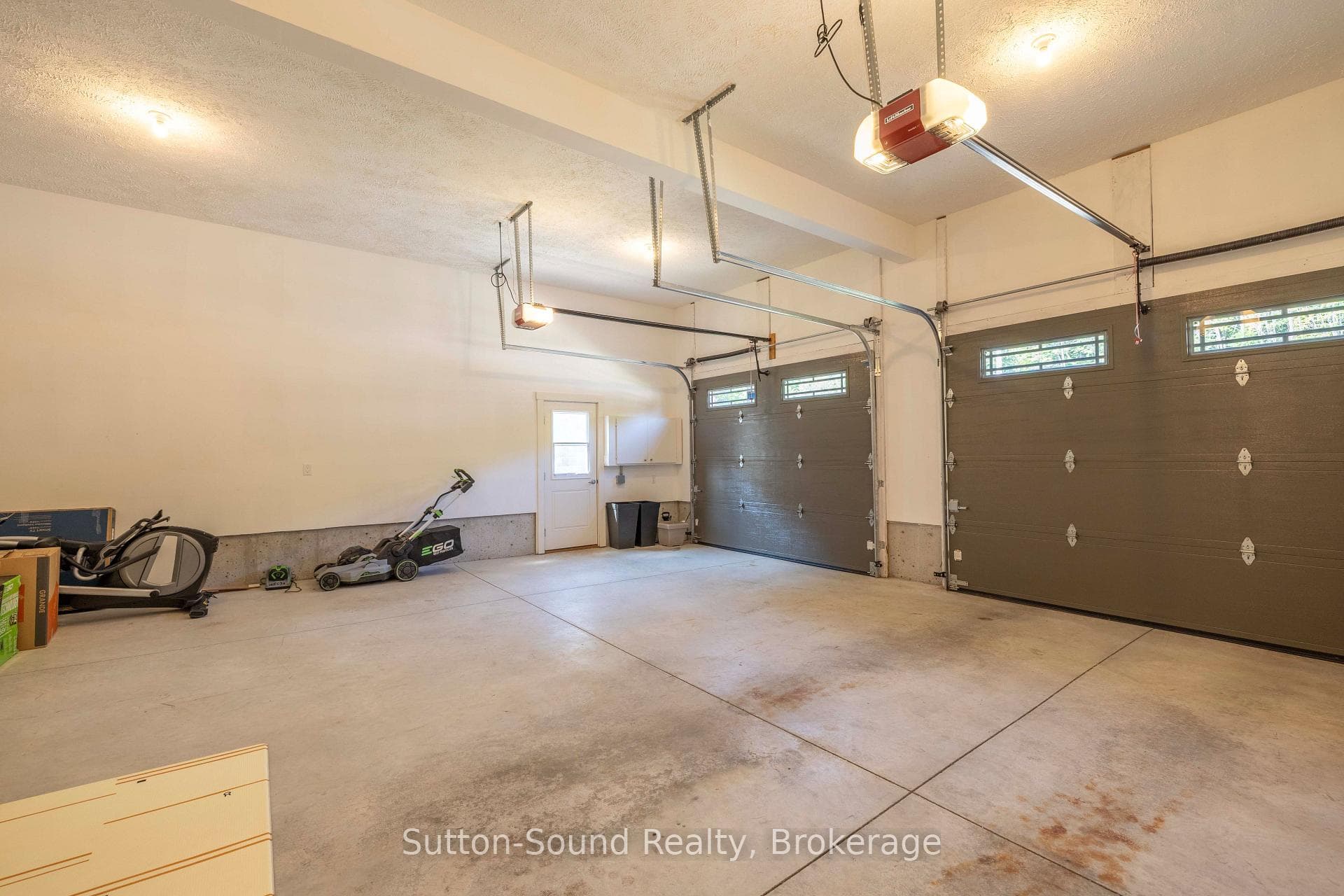 Large 2 car garage with man door