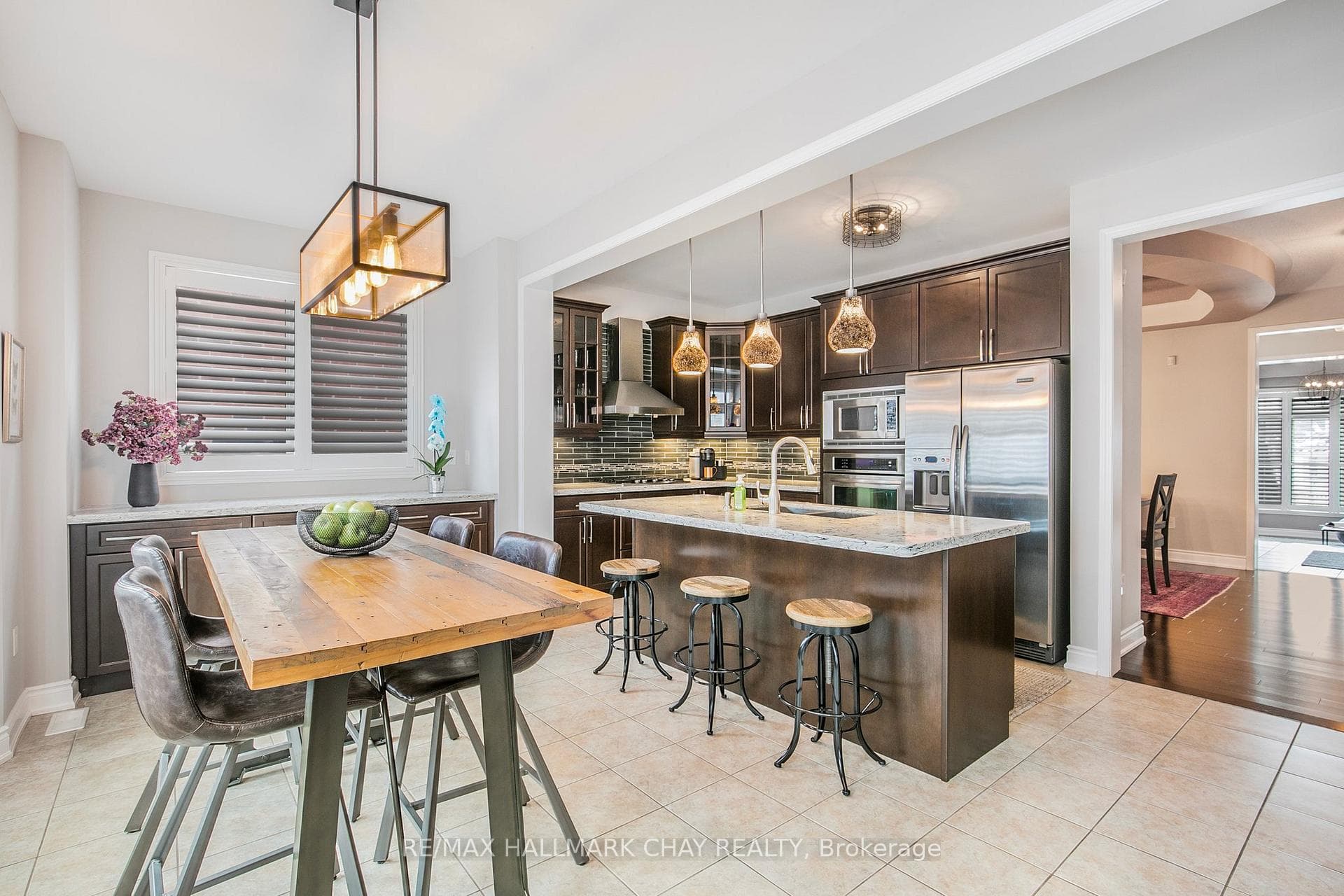 Chefs eat in Kitchen with granite counters