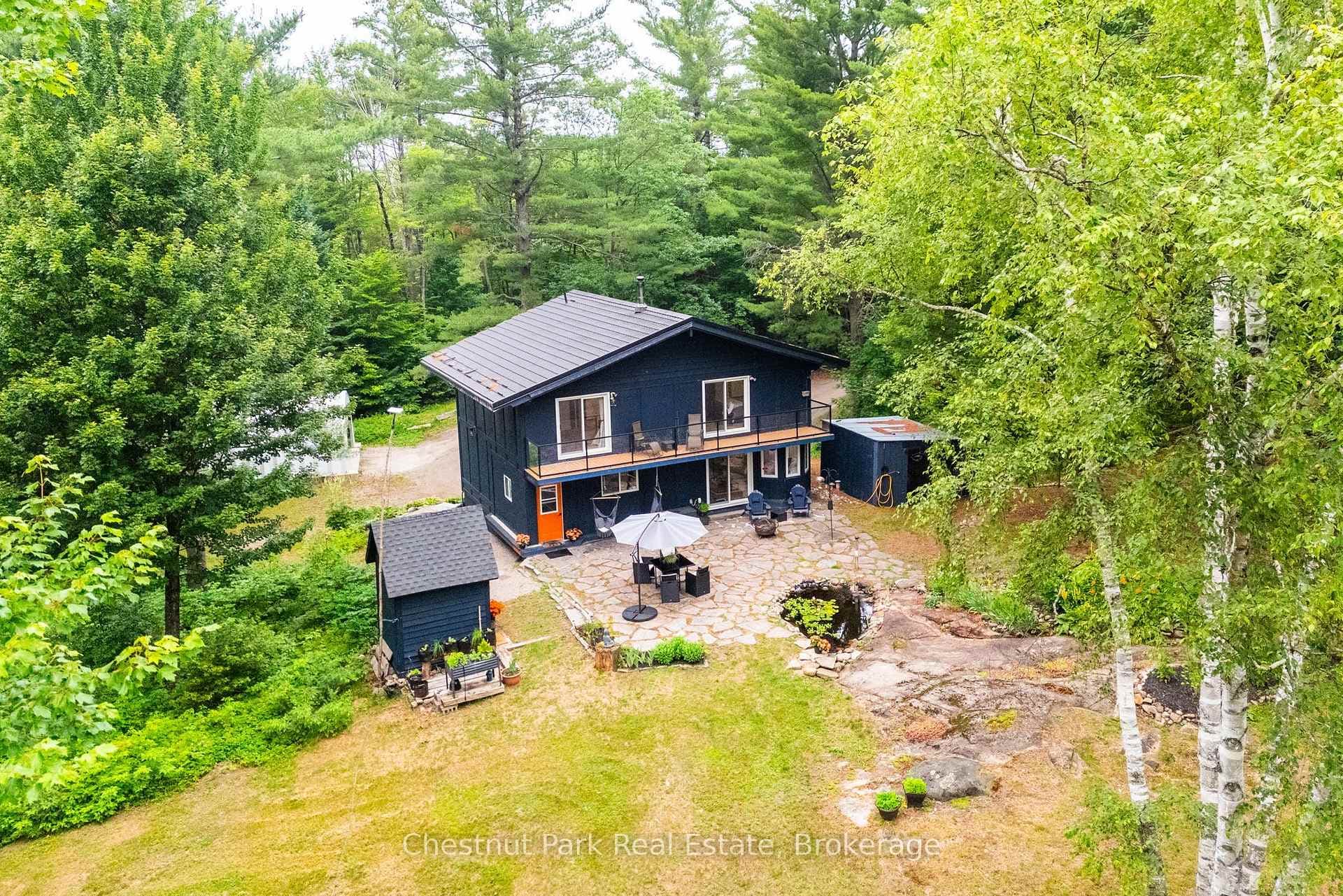 25 acres managed forest & wood storage shed