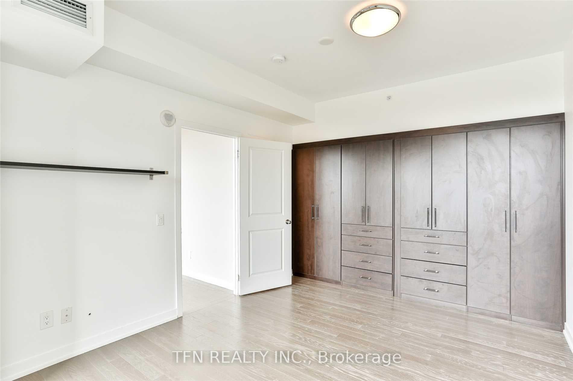 Primary Bedroom with Custom Built-in Closets