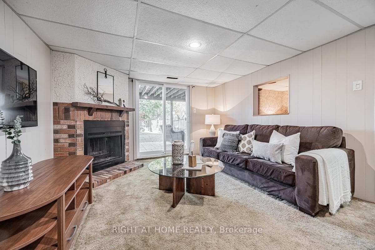 Basement Family Room with Wood Burning Fireplace