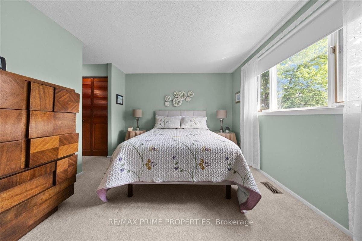 Primary bedroom overlooking peaceful park