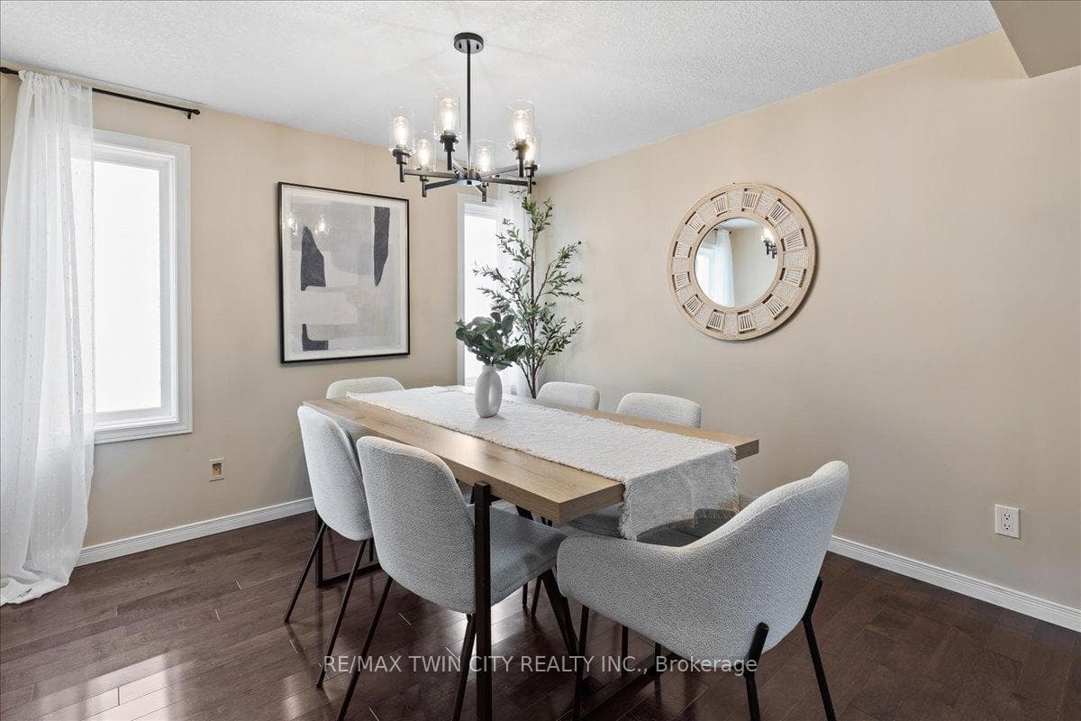 Separate dining room with hardwood floors
