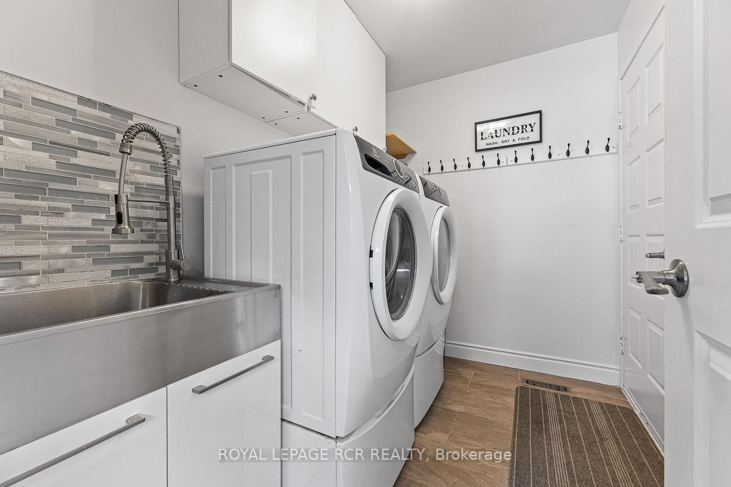 Main Floor Laundry with Garage Access