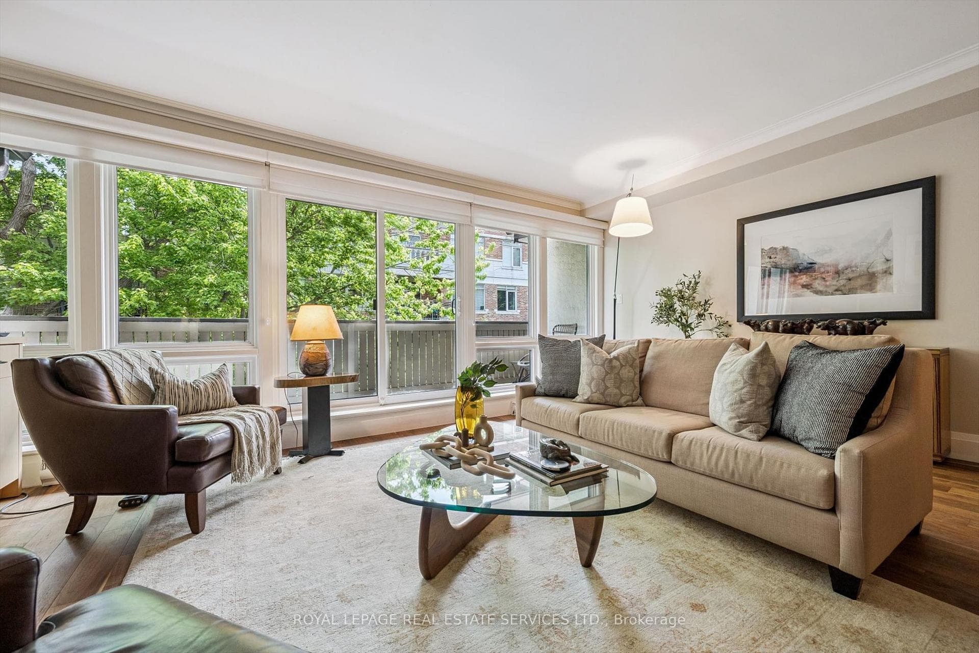 Inviting Living Room w/Walkout to Private Balcony