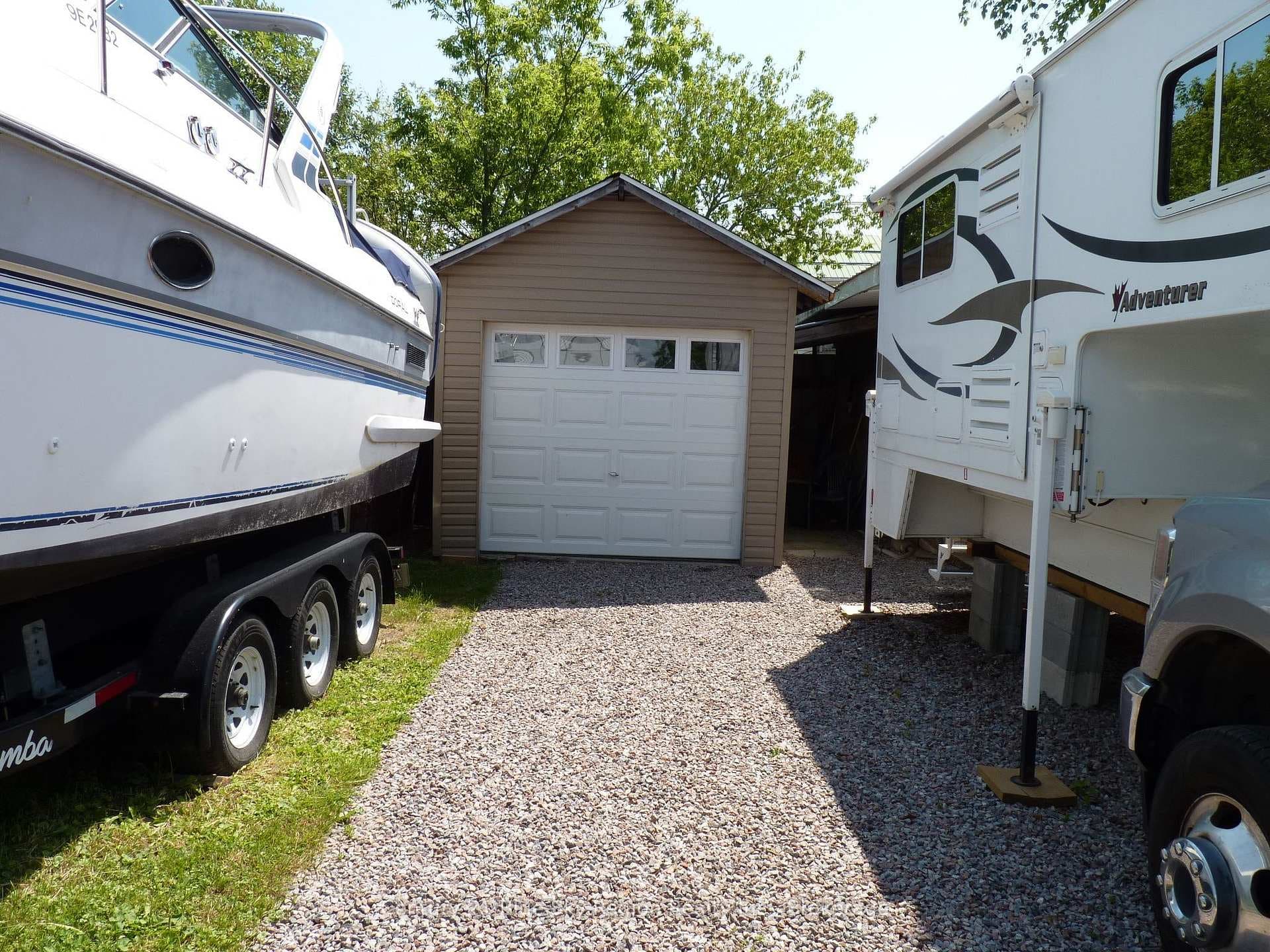 SHED WITH GARAGE DOOR