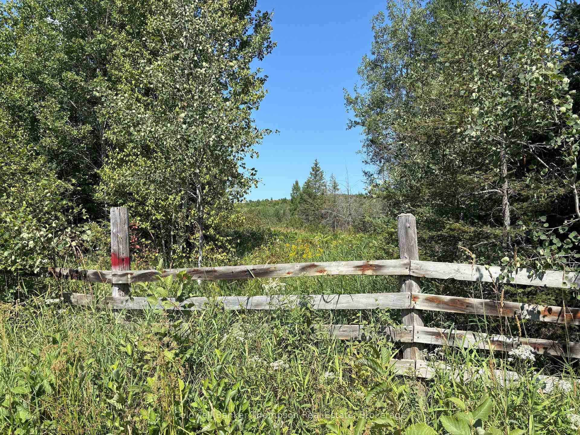 Fenced at the road.