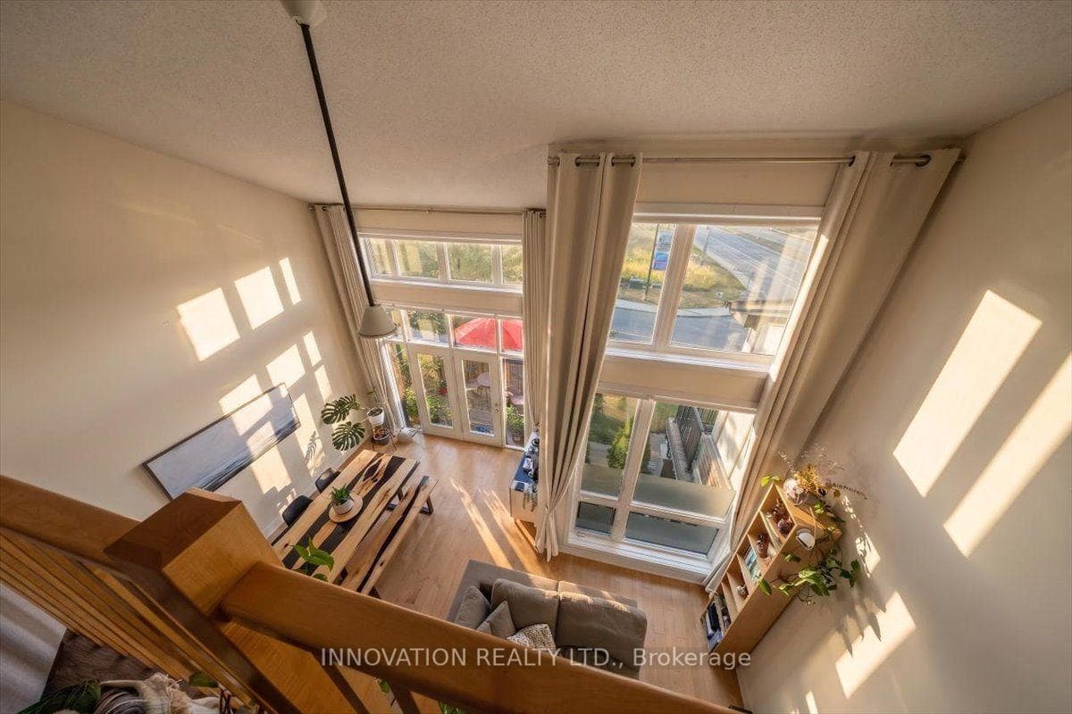 Expansive windows create bright, sun-filled spaces