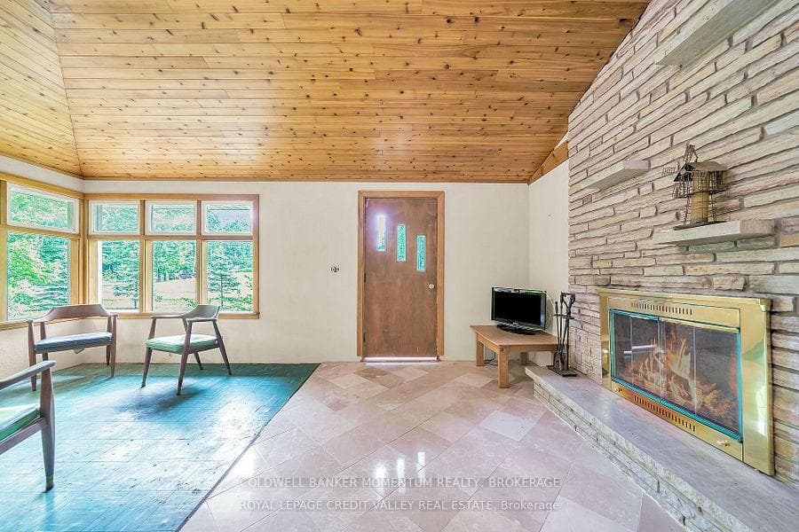Main living space with beautiful wood ceilings