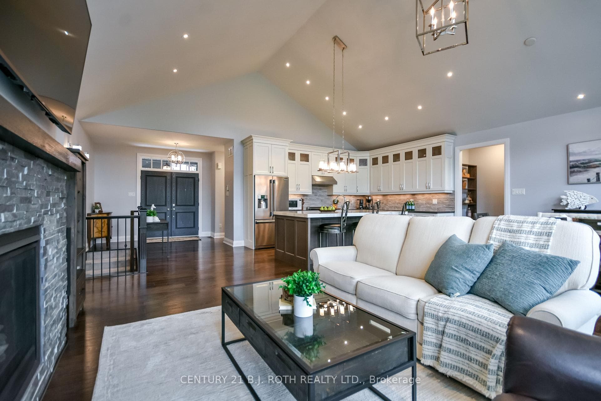 Sun filled open concept main with vaulted ceiling!