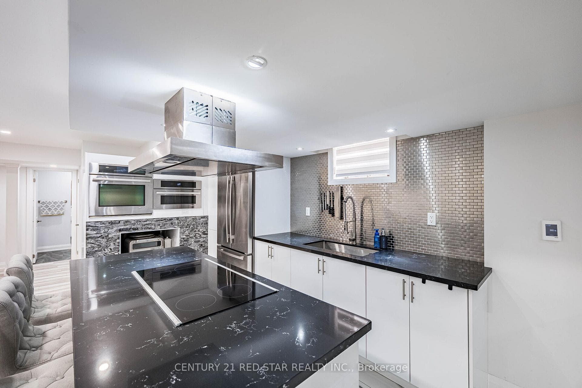 Lower kitchen designed by a chef and heated floors
