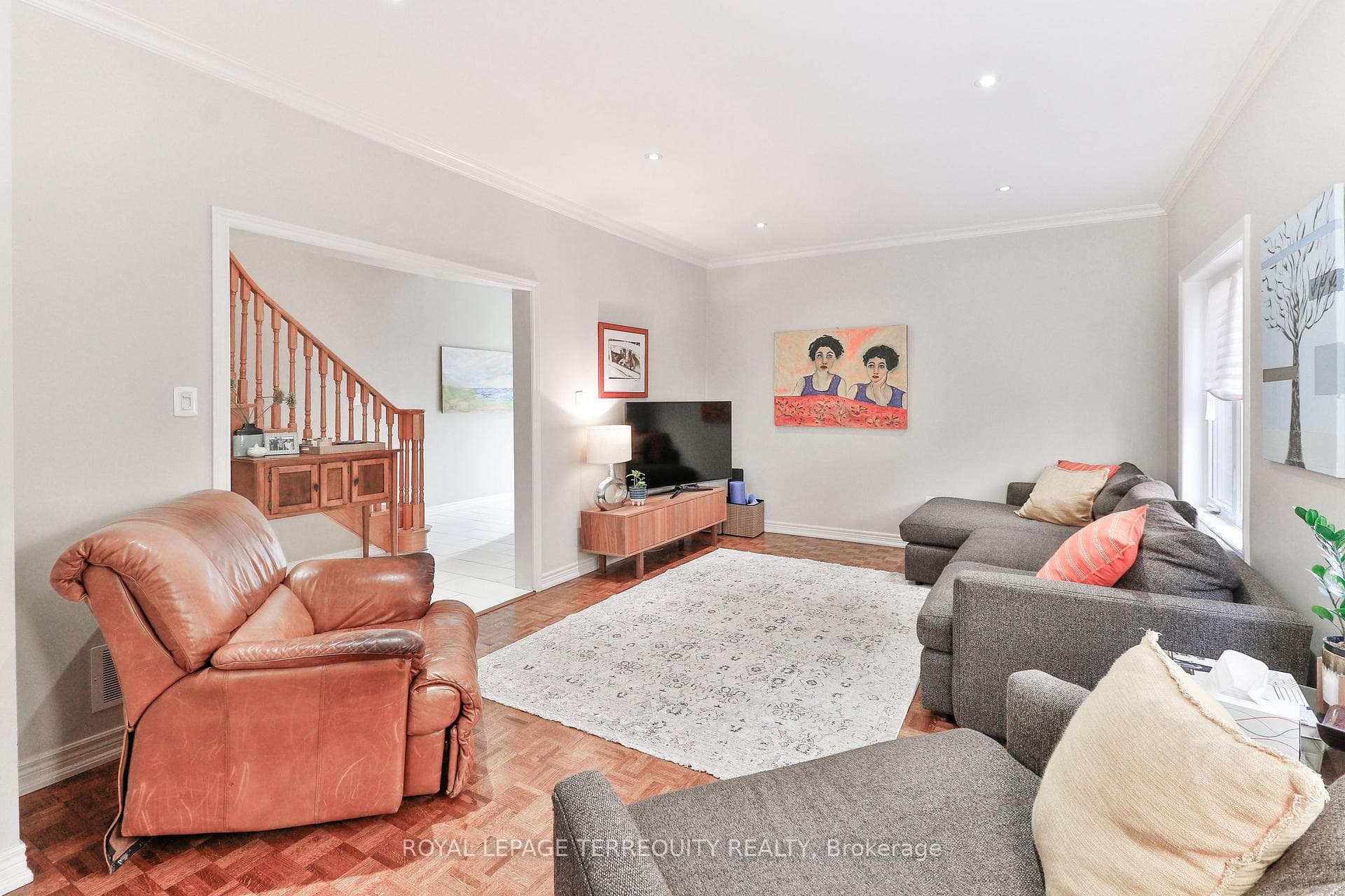 Family Room with Pot Lights and Crown Moulding