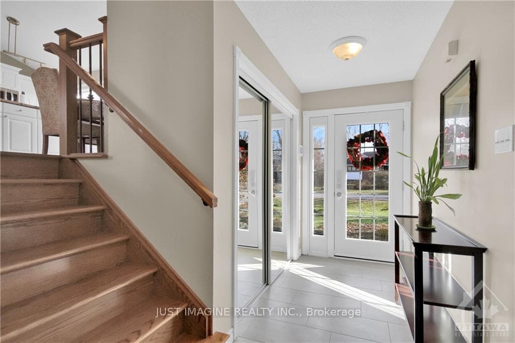 Foyer is on main floor up 4 steps to 1st floor gre