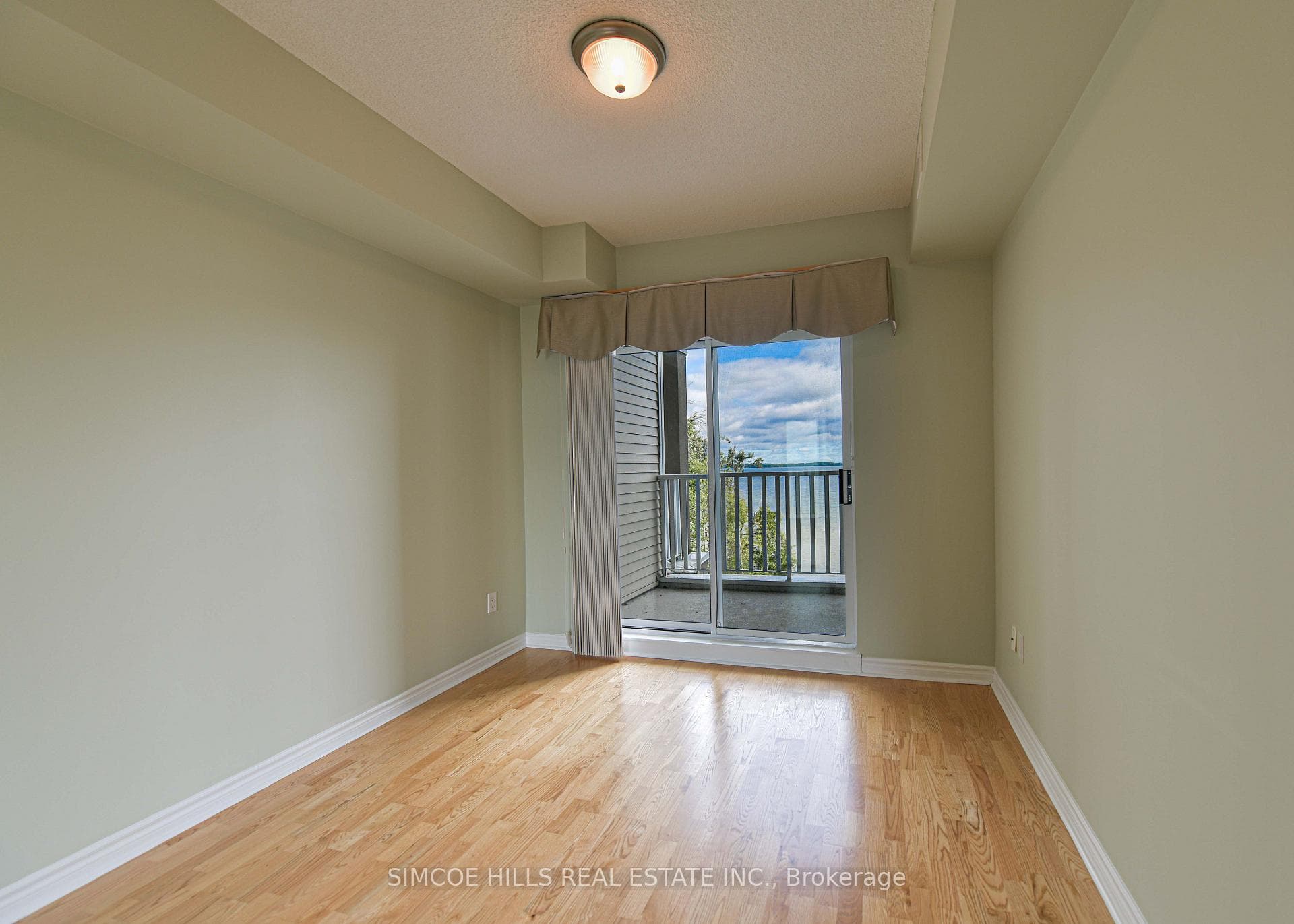 2nd bedroom with walkout to balcony