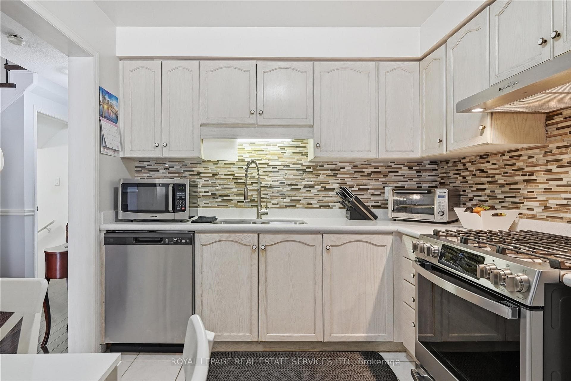 Kitchen is Equipped w/Matching GE S/S Appliances
