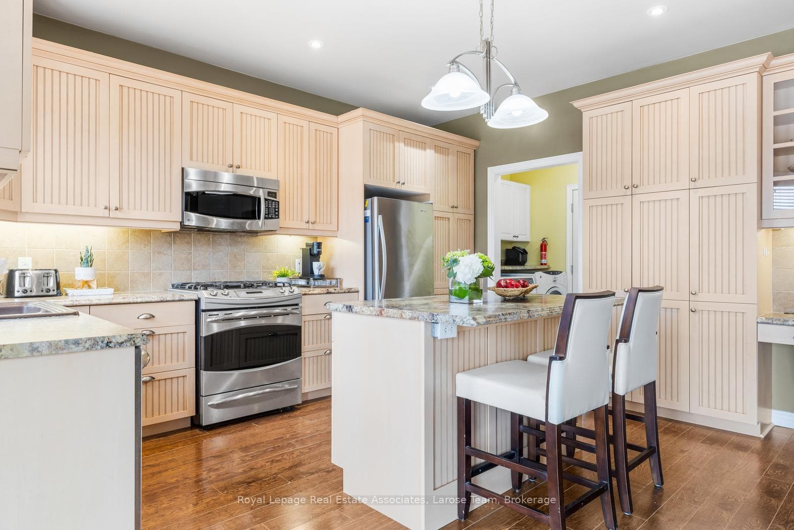 Kitchen w/ Island, lots of Cupboard Space & Pantry