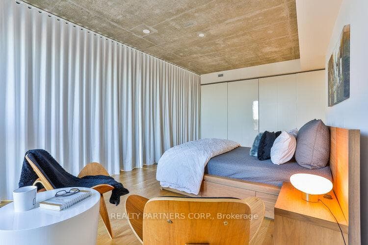 Large Primary bedroom king size bed and seating