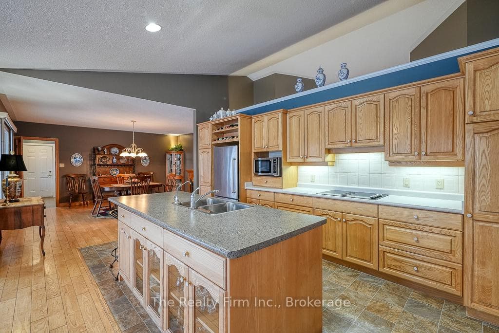 Open concept kitchen/dining/living