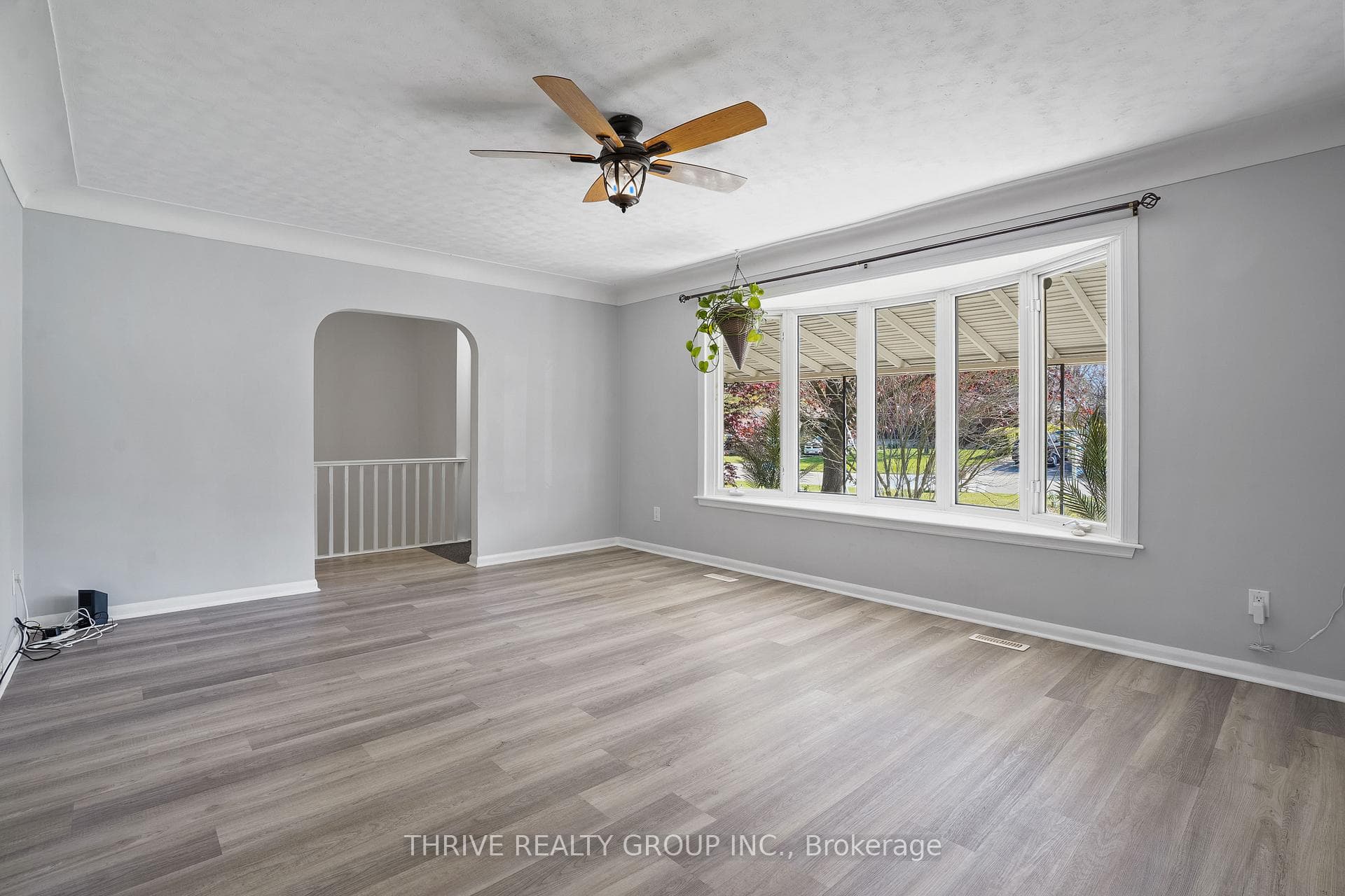 Main floor living room with bay window