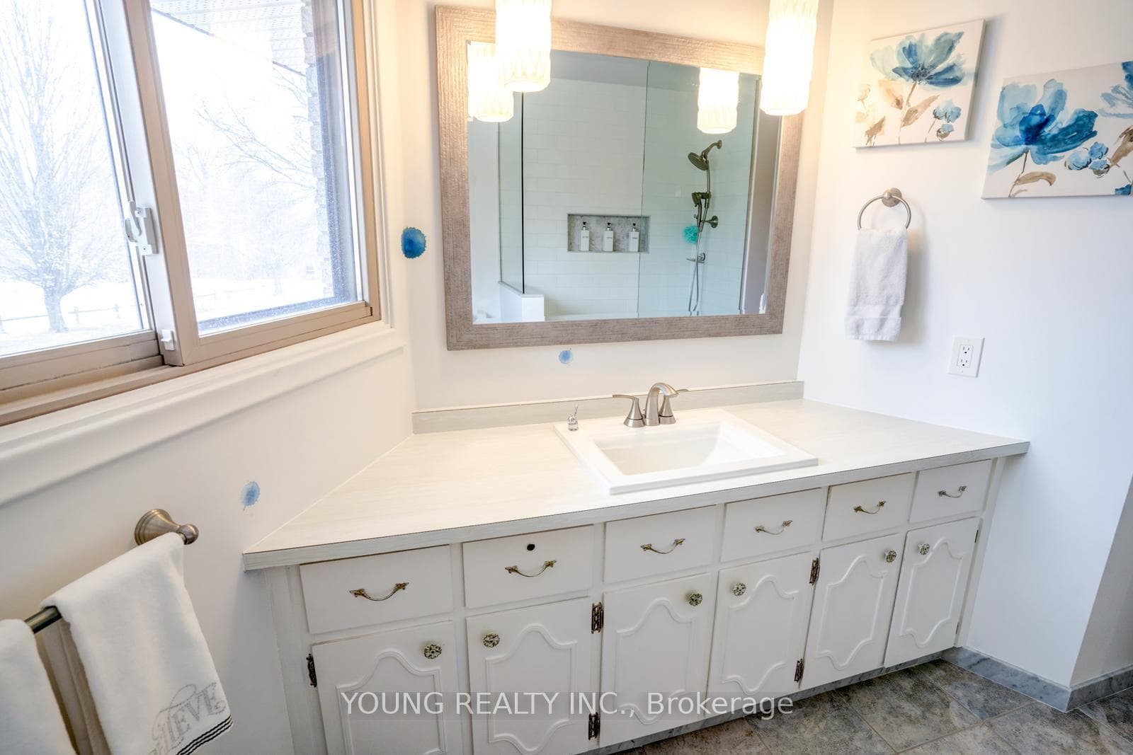 White Cabinets and Large Window