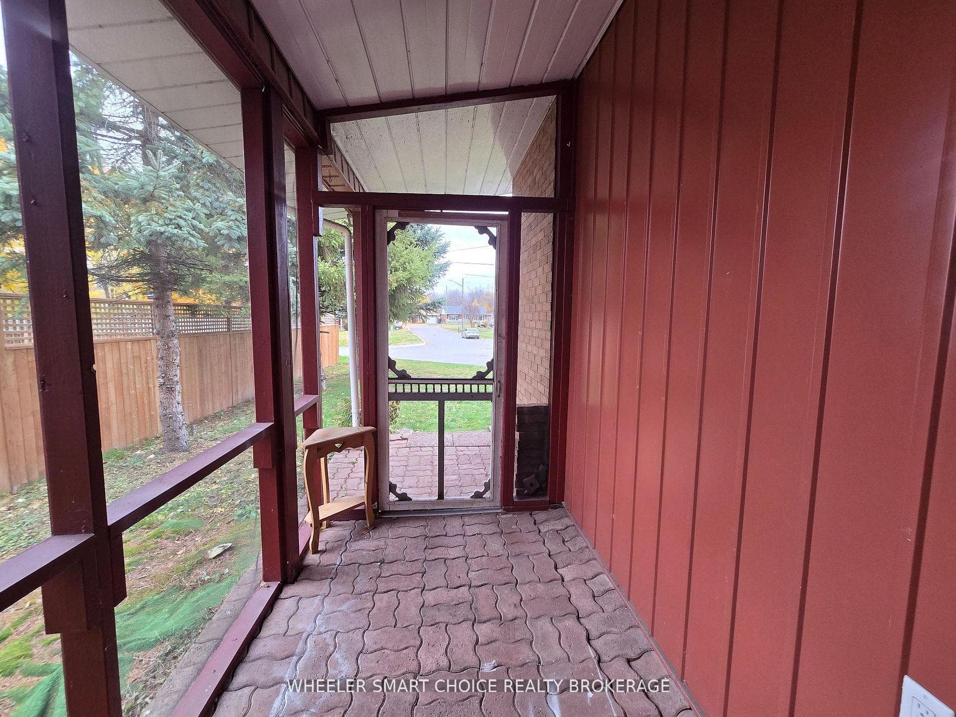 The quaint private screened in porch