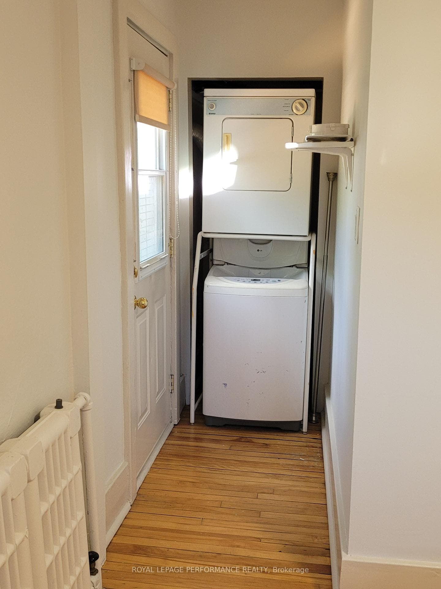 Laundry in the primary bedroom, door to the deck