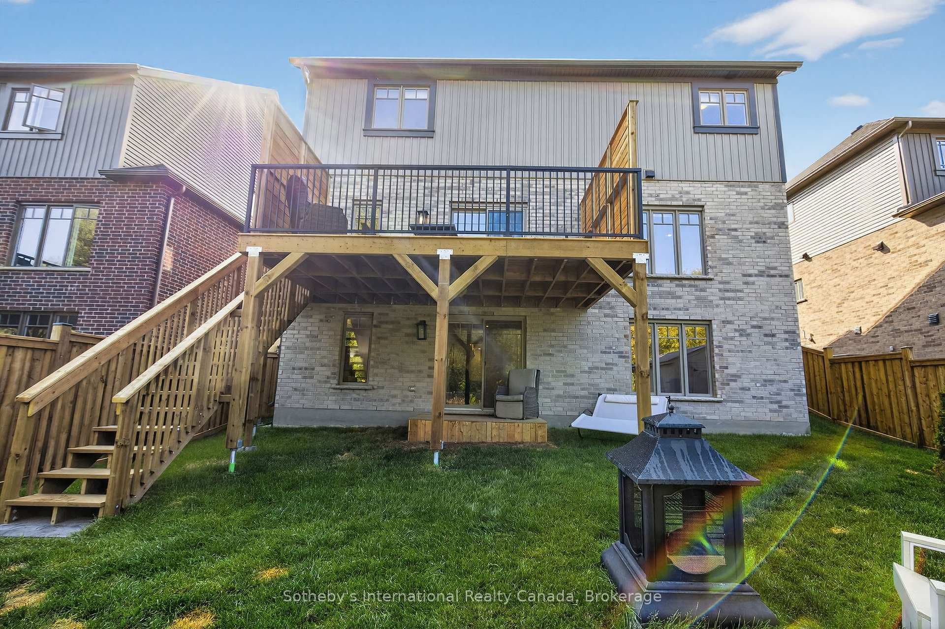 Upper deck with stairs to back yard