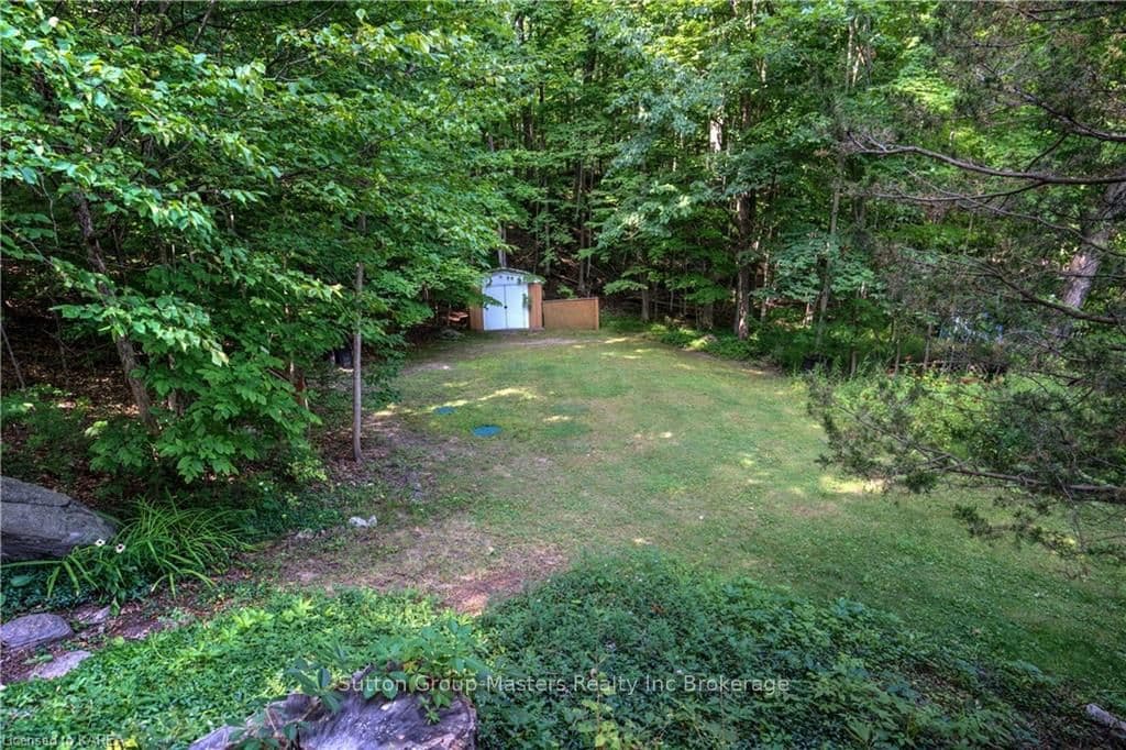 Storage shed just behind the septic bed