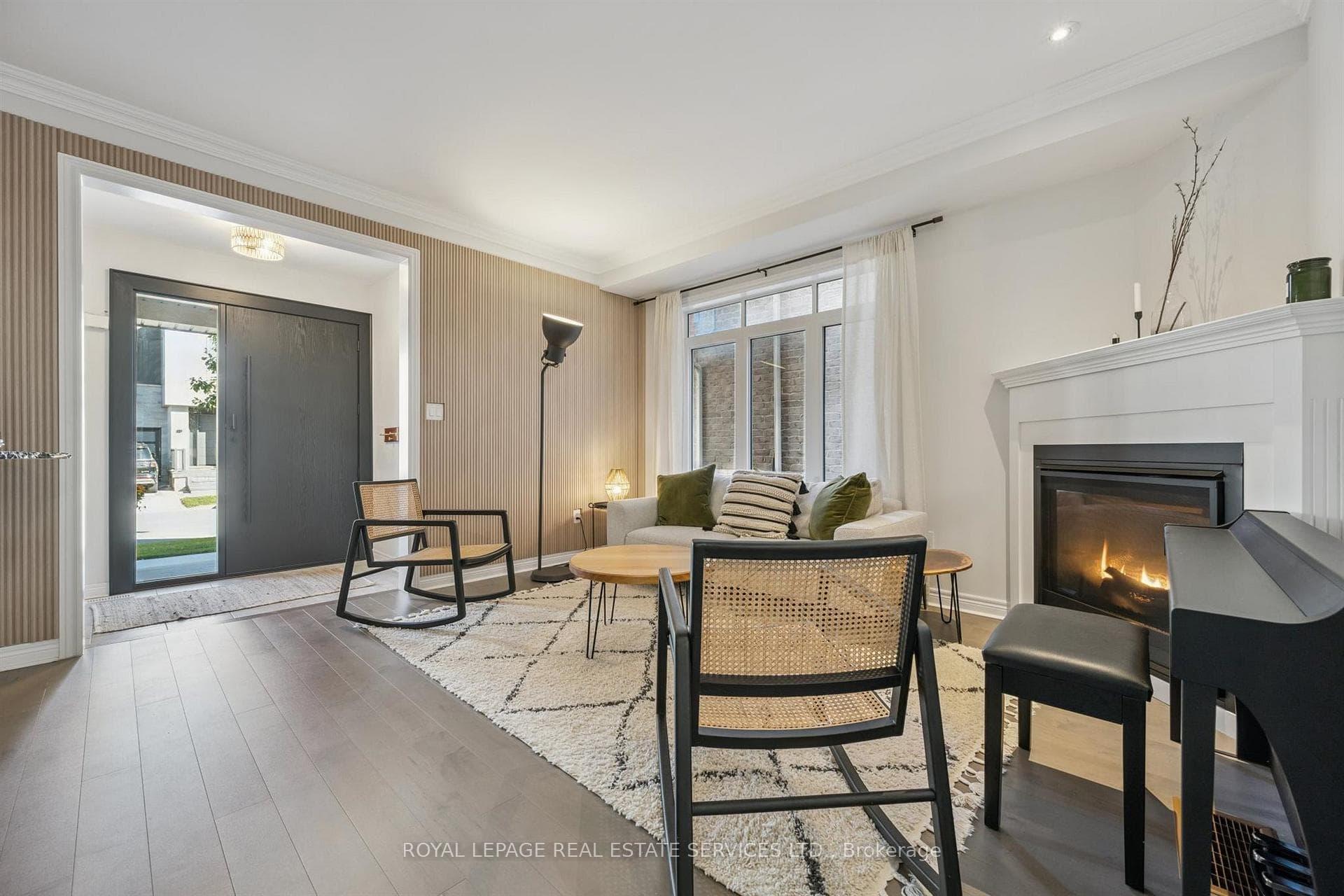 Living Room w/Accent Wall and Corner Gas Fireplace