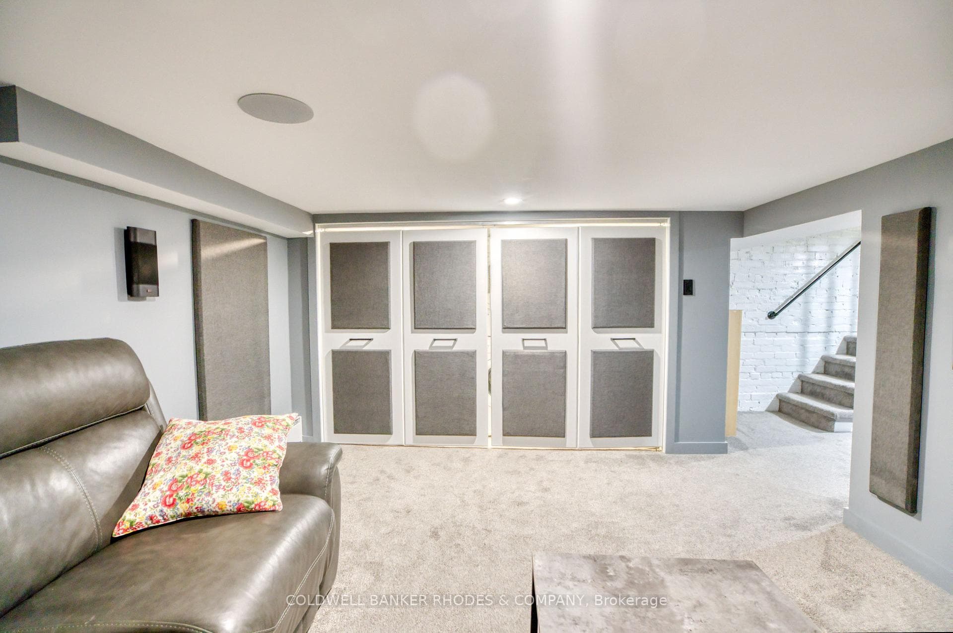 Laundry conveniently hidden behind closet doors