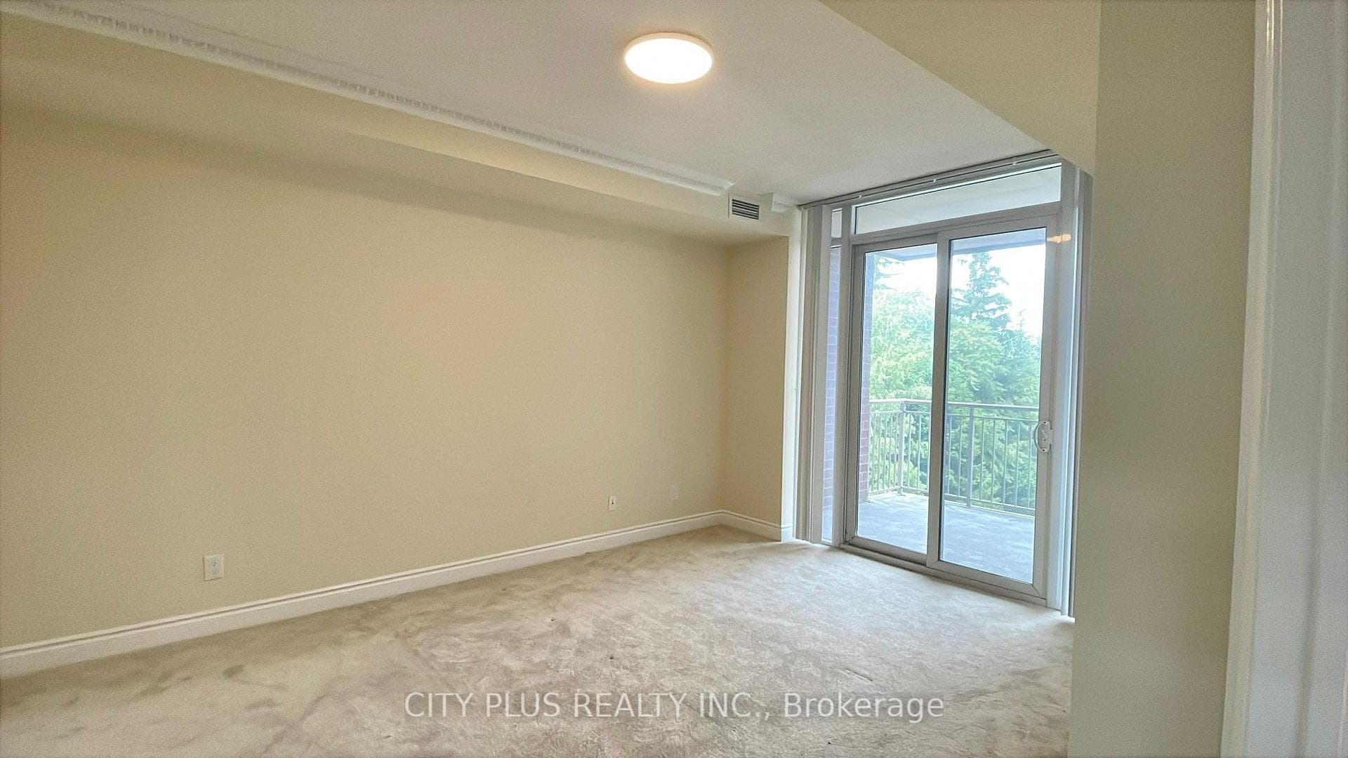 Primary Bedroom With Access To Balcony